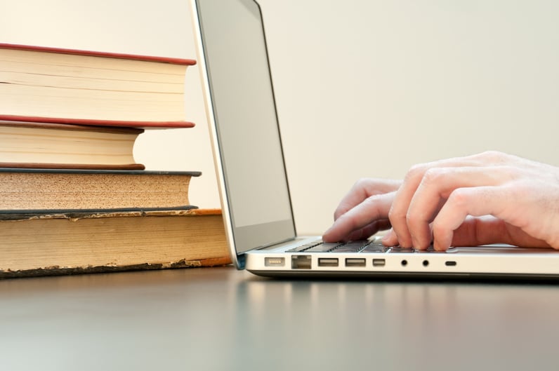 Laptop and books